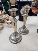 PAIR OF ANTIQUE PLATED CANDLESTICKS