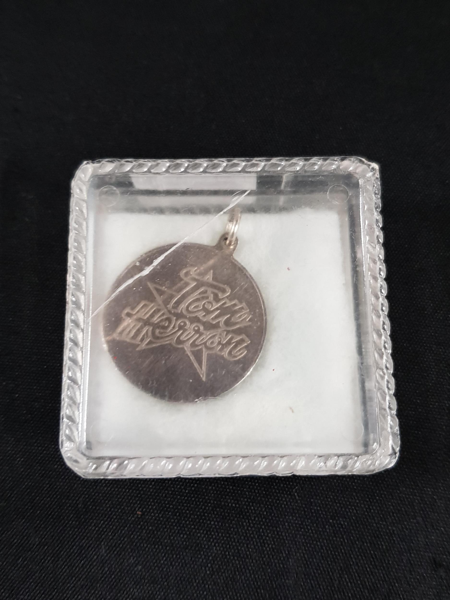 RARE SILVER TOM HERON MOTORCYCLING PENDANT