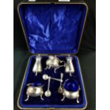 ANTIQUE SILVER CRUET SET WITH BLUE LINERS