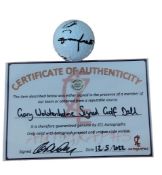 SIGNED GOLF BALL BY GARY WOLSTENHOLME WITH C.O.A