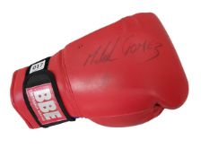 SIGNED BOXING GLOVE BY MICHAEL GOMEZ