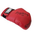 SIGNED BOXING GLOVE BY SYLVESTER MITTEE AND POSSIBLY SAMMY MCCARTHY