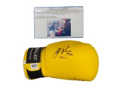 SIGNED BOXING GLOVE BY JIMMY REVIE WITH C.O.A