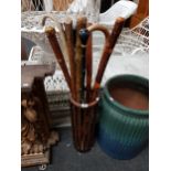 OLD STICK STAND WITH WALKING STICKS