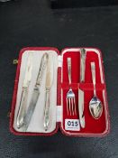 SILVER PLATED CASED CHRISTENING SET AND 3 SILVER HANDLED BUTTER KNIVES