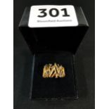 18 CARAT GOLD AND SAPPHIRE DESIGNER RING 6.5 GRAMS