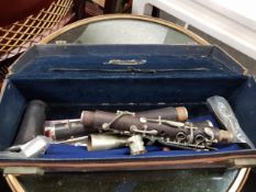 EARLY 1900'S CLARINET IN BROWN LEATHER CASE