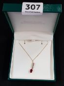 9 CARAT GOLD RUBY AND DIAMOND DROP ON GOLD CHAIN