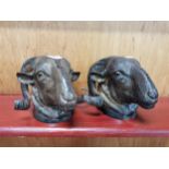 PAIR OF METAL RAMS HEADS