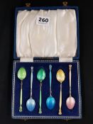 ANTIQUE SILVER AND ENAMEL HARLEQUIN SET OF COFFEE SPOONS