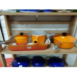 SET OF ORANGE ENAMEL LECREUSET SAUCEPANS AND LARGE OVEN DISH