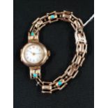 LADIES 9 CARAT GOLD CASED ANTIQUE WRIST WATCH WITH EXPANDING BRACELET