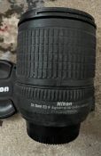 NIKON DX AF-S NIKKOR 19-135mm 1:2.5-5.6G ED Nikkor 19-135mm 1:2.5-5.6G ED with both caps