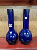 PAIR OF 19TH CENTURY CHINESE PEKING GLASS BOTTLE VASES IN A ROYAL BLUE METAL. 12.5" TALL