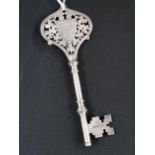 SILVER PRESENTATION KEY INSCRIBED 'PRESENTED TO A.H.THOMPSON BY COOLMORE CO. ON THE OCCASION OF