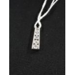 14 CARAT WHITE GOLD PENDANT WITH 0.85 CARAT OF GRADUATING DIAMONDS