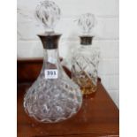 2 SILVER RIMMED DECANTERS