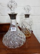 2 SILVER RIMMED DECANTERS