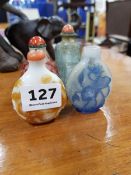 4 GLASS OVERLAID AND CARVED SNUFF BOTTLES