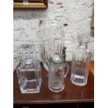 LARGE CUT GLASS VASE, 2 GLASS DECANTERS AND A CUT GLASS BAVARIAN TANKARD