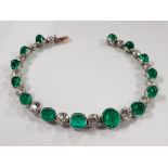 PLATINUM & 18 CARAT GOLD FRENCH DIAMOND & EMERALD BRACELET DATING TO CIRCA 1920-1930'S. THERE ARE 14