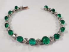 PLATINUM & 18 CARAT GOLD FRENCH DIAMOND & EMERALD BRACELET DATING TO CIRCA 1920-1930'S. THERE ARE 14