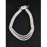 3 STRAND PEARL NECKLACE WITH 14 CARAT GOLD CATCH & SPACERS