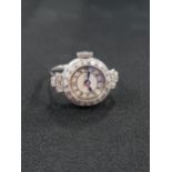 18 CARAT WHITE GOLD RING MOUNTED WITH DIAMOND ENCRUSTED WATCH