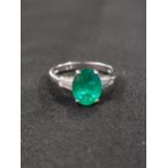 PLATINUM EMERALD AND DIAMOND RING