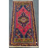 SMALL RED WOOLEN RUG