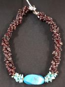 PAIR OF CHUNKY GARNET AND TURQUOISE BEADS