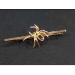 9 CARAT GOLD BROOCH WITH DETAILED SPIDER. PINK AND GREEN STONES