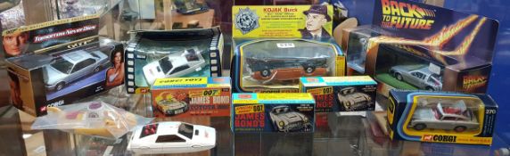 SHELF LOT OF COLLECTABLE MODEL CARS TO INCLUDE 007, BACK TO THE FUTURE AND YELLOW SUBMARINE