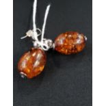 SILVER AND AMBER PAIR OF EARRINGS
