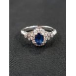 14 CARAT WHITE GOLD DIAMOND & SYNTHETIC SAPPHIRE RING