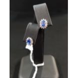 BEAUTIFUL PAIR OF 18 CARAT WHITE GOLD, DIAMOND AND SAPPHIRE EARRINGS
