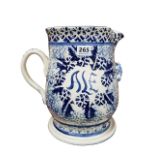 LARGE BLUE AND WHITE SPONGEWARE ALE PITCHER