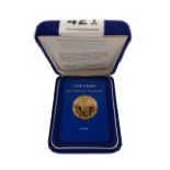 THE 1979 ONE HUNDRED DOLLAR GOLD COIN OF THE COOK ISLANDS 9.76G OF 900/1000 FINE GOLD