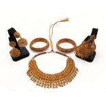 SUITE OF ASIAN 21 CARAT JEWELLERY COMPRISING A NECKLACE, 2 BANGLES AND 2 PAIRS OF EARRINGS CIRC 78G