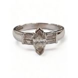 18 CARAT WHITE GOLD AND DIAMOND RING WITH MARQUISE CENTRE STONE CIRCA 1.2 CARAT OF DIAMONDS TOTAL