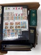 BOX OF STAMP ALBUMS AND FIRST DAY COVERS