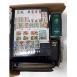 BOX OF STAMP ALBUMS AND FIRST DAY COVERS