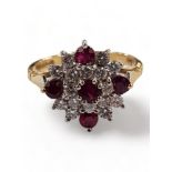 18 CARAT GOLD RUBY AND DIAMOND CLUSTER RING
