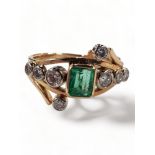 9 CARAT YELLOW GOLD EMERALD & DIAMOND RING WITH 0.85 CARAT OF EMERALDS & 0.85 CARAT OF DIAMONDS.