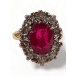 18 CARAT YELLOW GOLD AND RUBY RING CIRCA HALF CARAT OF DIAMONDS, RUBY MEASURES APPROX 10MM LENGTH