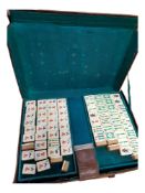 ANTIQUE ORIENTAL MAHJONG SET IN LEATHER CASE