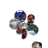 COLLECTION OF COLOURED GLASS PAPERWEIGHTS