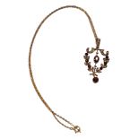 9 CARAT GOLD GARNET AND SEED PEARL PENDANT ON 9 CARAT GOLD CHAIN GROSS 3.72G