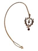 9 CARAT GOLD GARNET AND SEED PEARL PENDANT ON 9 CARAT GOLD CHAIN GROSS 3.72G