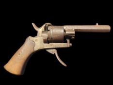 A .22” Pinfire Mini Revolver. 2.4” barrel. Loading door/flap missing. Liege proof mark on